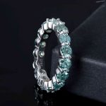 green moissanite ring