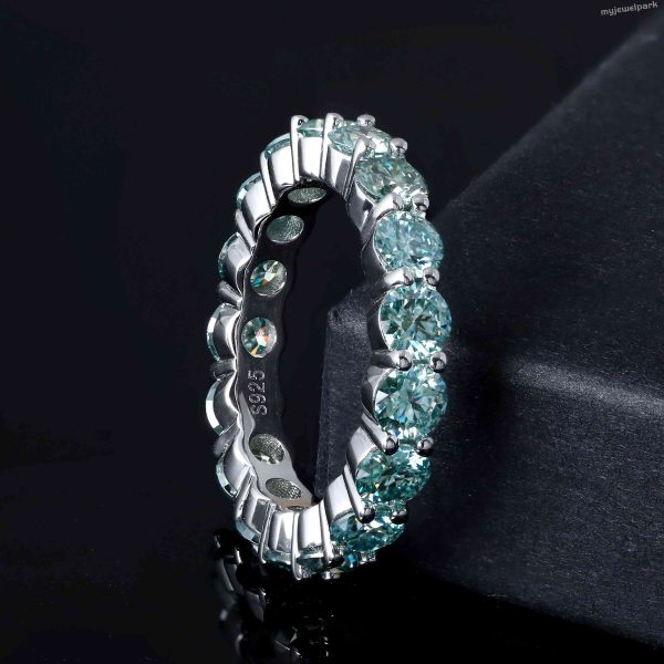 green moissanite ring